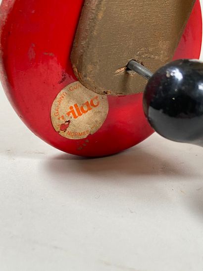Two rolling pull-along toys:
- Donald and...