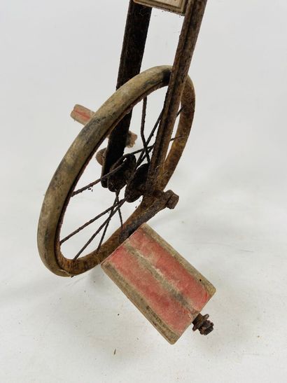 Wood and metal tricycle, adjustable seat.
59...
