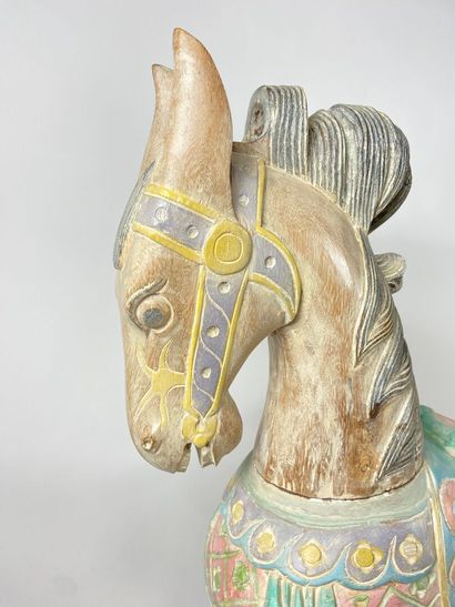 Modern merry-go-round horse in polychrome...