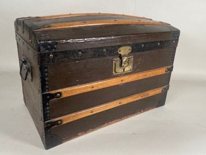 Antique travel trunk containing recent knitted...