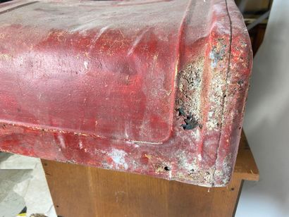 Pedal car in red painted sheet metal.
43...