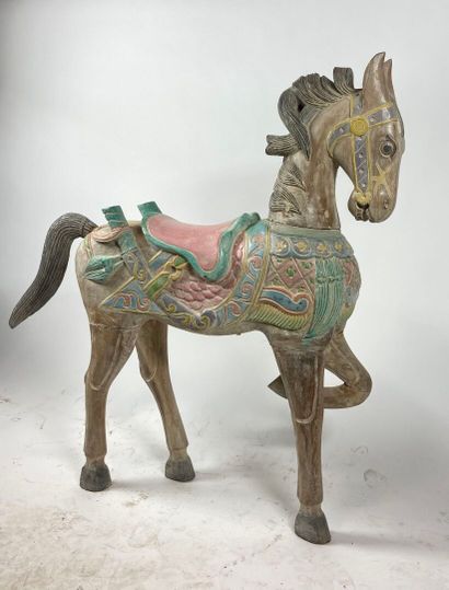 Modern merry-go-round horse in polychrome...