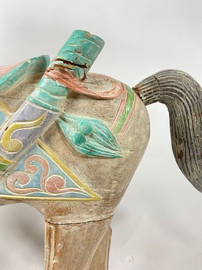 Modern merry-go-round horse in polychrome...