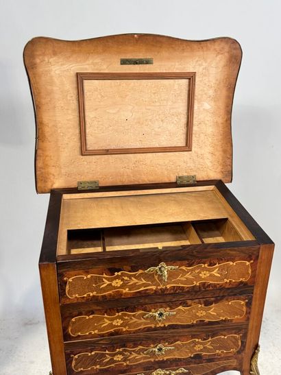 Wood and marquetry work table with foliate...