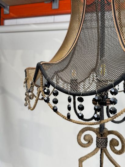 Tripod floor lamp in metal sheathed in black...