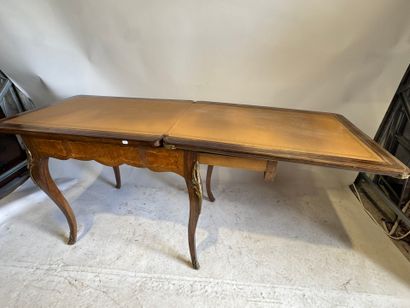 Wooden game table with cubes and foliate...
