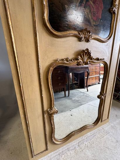 Trumeau in molded, carved, gilded and beige...
