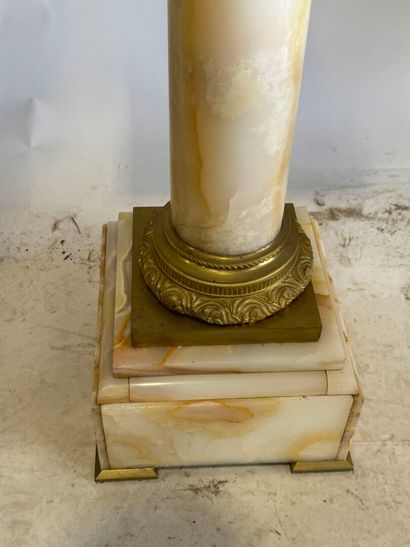 Onyx and chased ormolu column.
114 x 32 x...