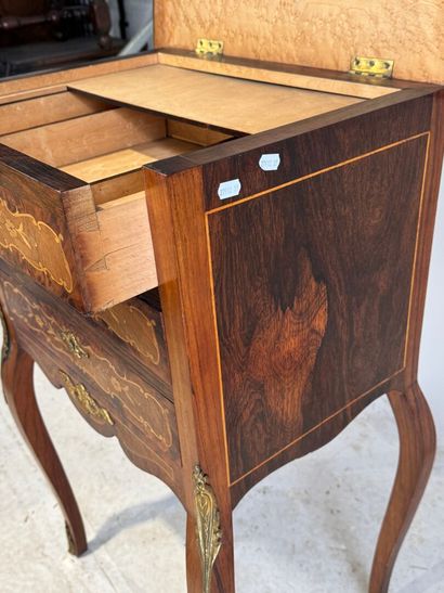 Wood and marquetry work table with foliate...