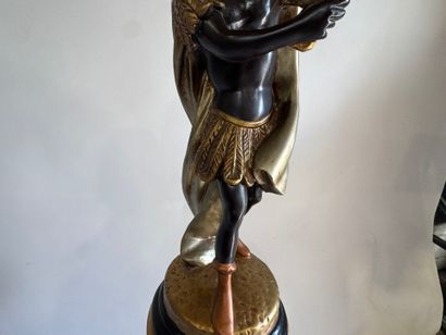 Nubian on saddle in polychrome resin, with...