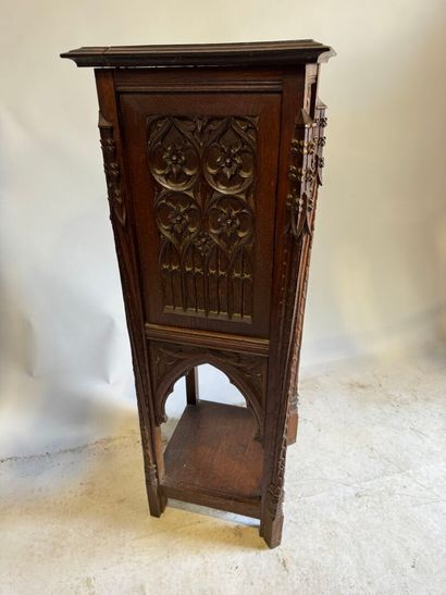 Molded and carved oak sellette, the upper...