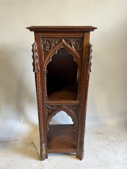 Molded and carved oak sellette, the upper...