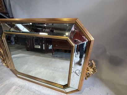 Large beveled octagonal mirror with glazing...