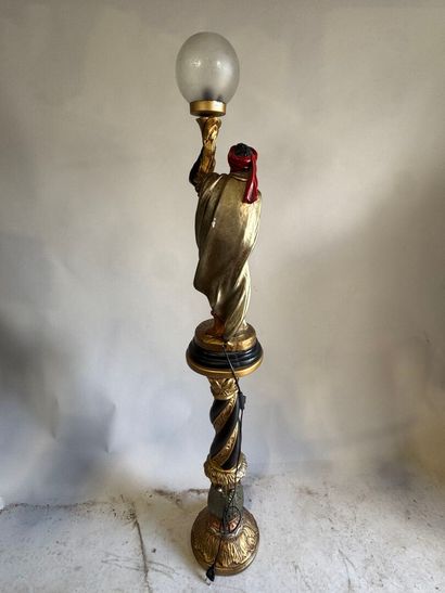 Nubian on saddle in polychrome resin, with...