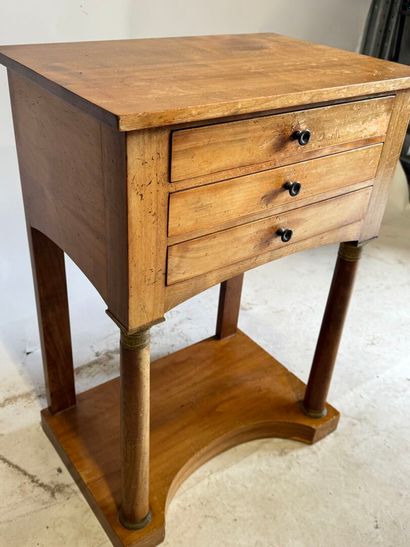 Wooden bedside table with detached columns...
