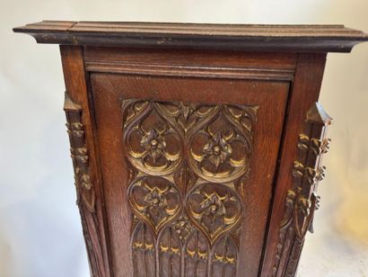 Molded and carved oak sellette, the upper...