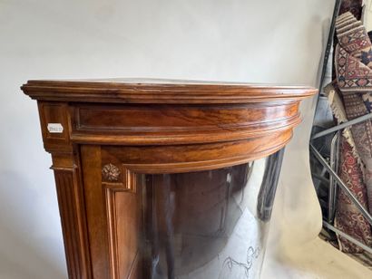 Corner display case opening with a door,...