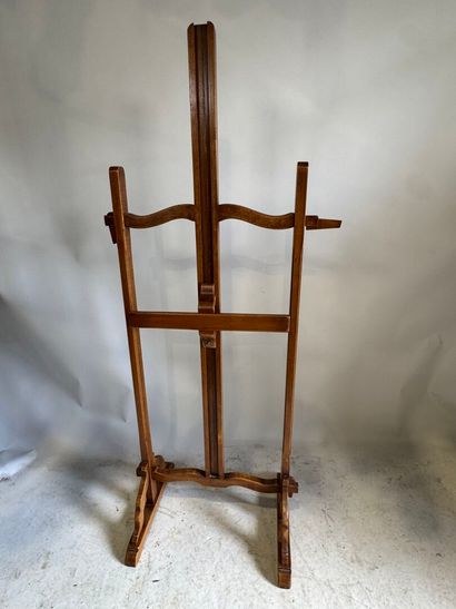 Wooden easel, central part adjustable in...