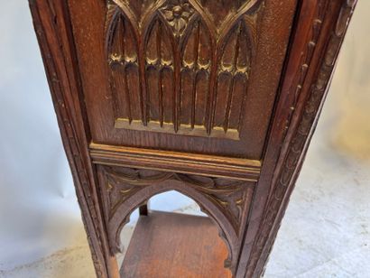 Molded and carved oak sellette, the upper...