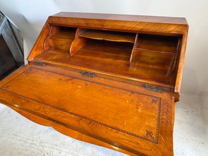Wood and veneer sloping desk opening with...