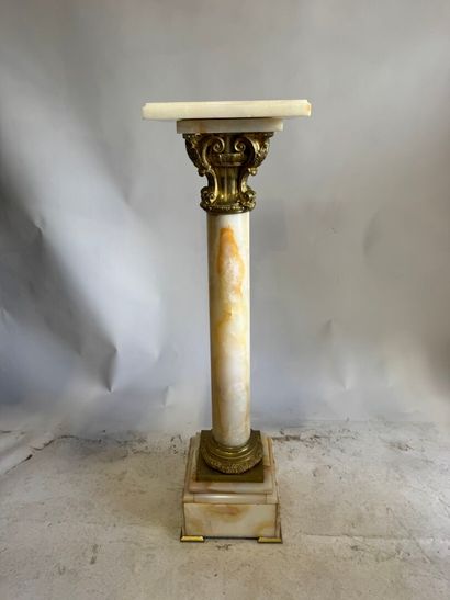 Onyx and chased ormolu column.
114 x 32 x...