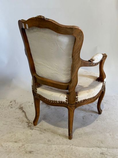 Wooden child's armchair, white silk studded...