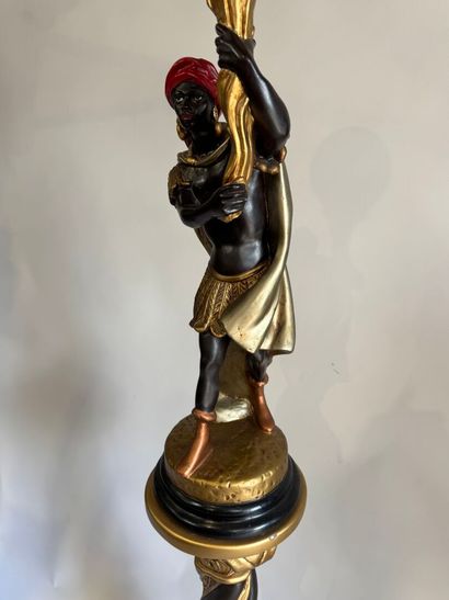Nubian on saddle in polychrome resin, with...