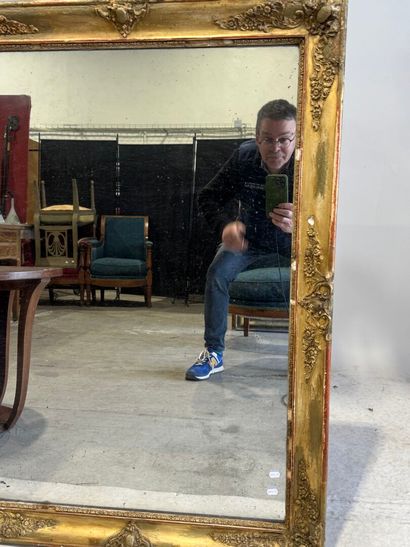 Rectangular wood and gilded stucco mirror...