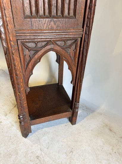 Molded and carved oak sellette, the upper...