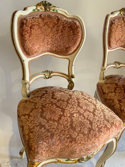 Pair of molded wood, polychrome and gold...
