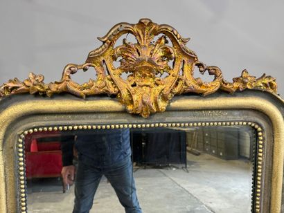 Large beveled mantelpiece mirror in gilded...
