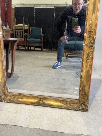 Rectangular wood and gilded stucco mirror...