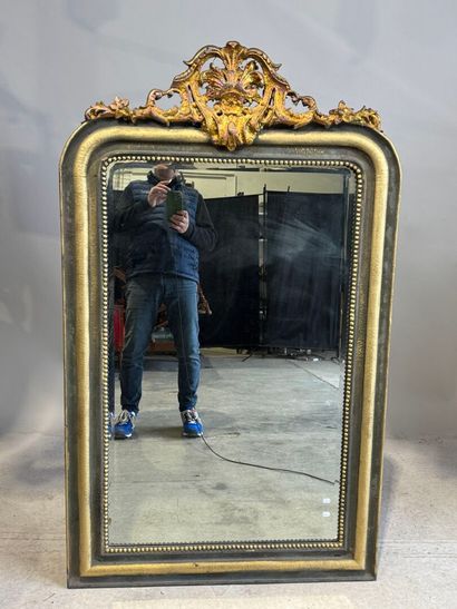 Large beveled mantelpiece mirror in gilded...