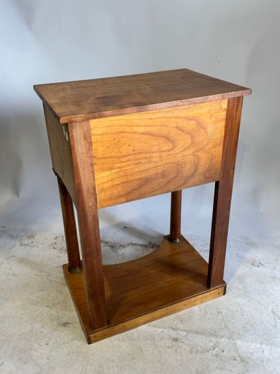 Wooden bedside table with detached columns...