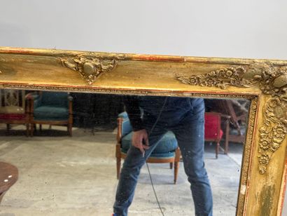 Rectangular wood and gilded stucco mirror...