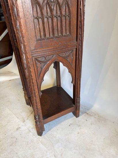 Molded and carved oak sellette, the upper...