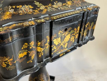Moulded and blackened wood working table...