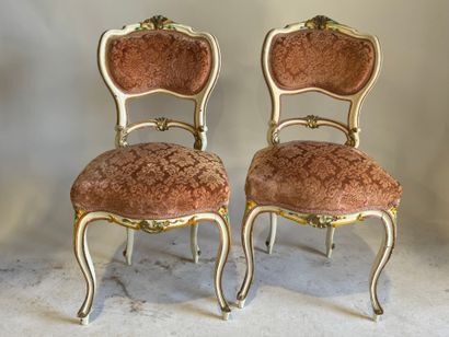 Pair of molded wood, polychrome and gold...