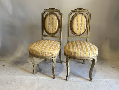Pair of medallion chairs in lacquered, molded...
