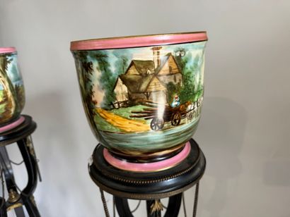 Pair of polychrome and gold porcelain planters...