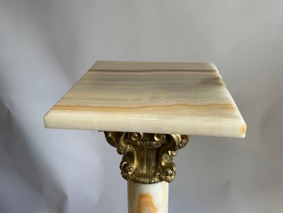 Onyx and chased ormolu column.
114 x 32 x...