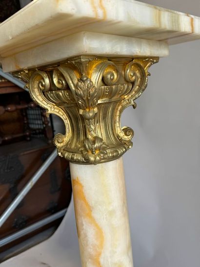 Onyx and chased ormolu column.
114 x 32 x...