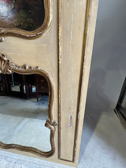Trumeau in molded, carved, gilded and beige...