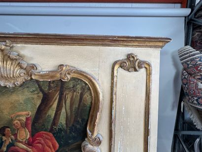 Trumeau in molded, carved, gilded and beige...