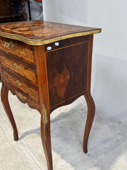 Wood and marquetry work table with foliate...