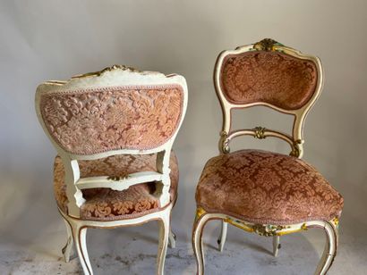 Pair of molded wood, polychrome and gold...