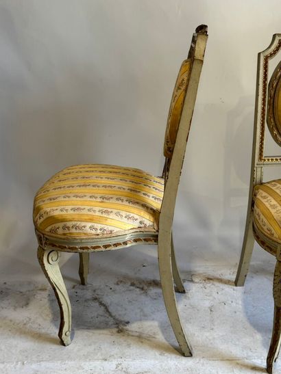 Pair of medallion chairs in lacquered, molded...