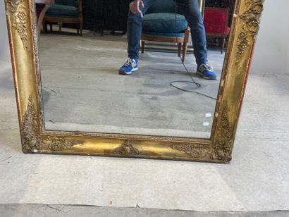 Rectangular wood and gilded stucco mirror...
