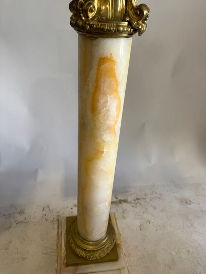 Onyx and chased ormolu column.
114 x 32 x...