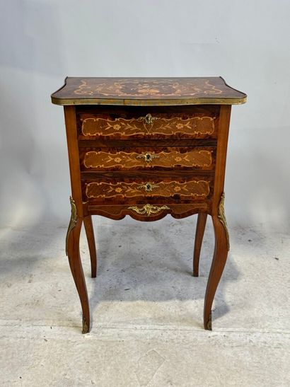 Wood and marquetry work table with foliate...